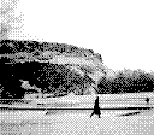 Person walking in front of Arthurs Seat, Edinburgh